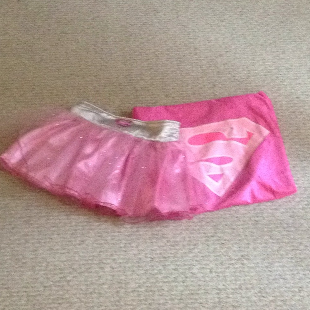 Pink tutu and a pink cape